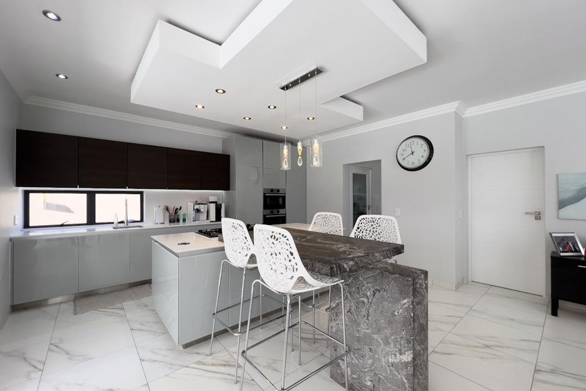 Hilltop Haven | Modern Multi-Level Marvel with Solar Power, Blueline Kitchen & Entertainer’s Garden - Photo 4