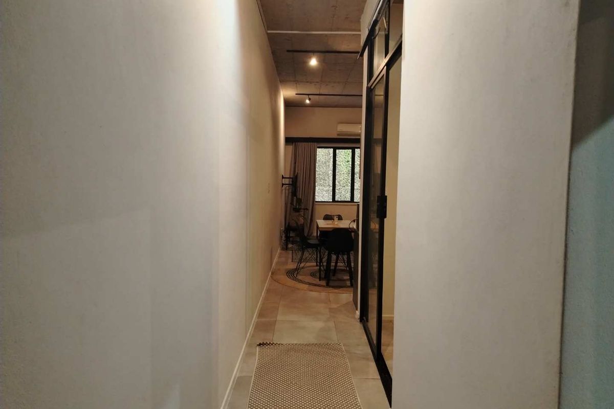 Stylish 1-Bedroom Apartment in the Prestigious Black Brick Building, Sandton - Photo 5