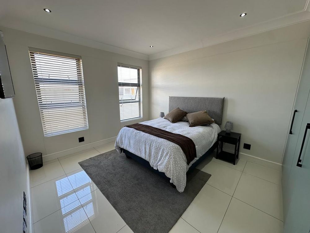 First bedroom downstairs with en-suite bathroom