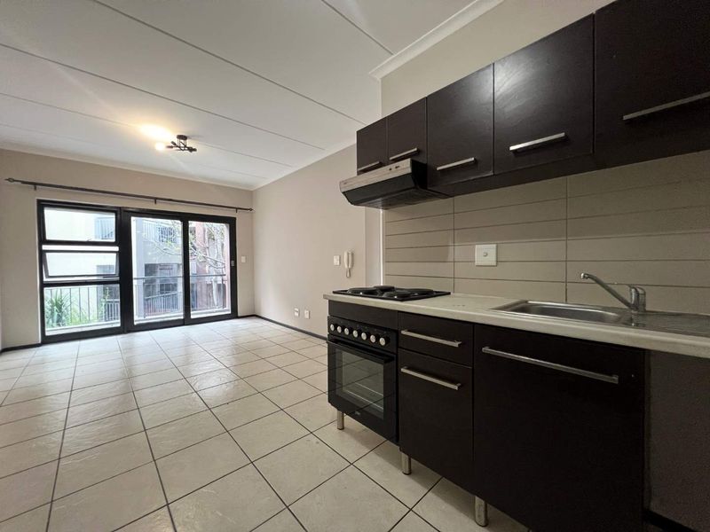 Live Securely in Style: 2-Bedroom Middle-Floor Gem! - Photo 6