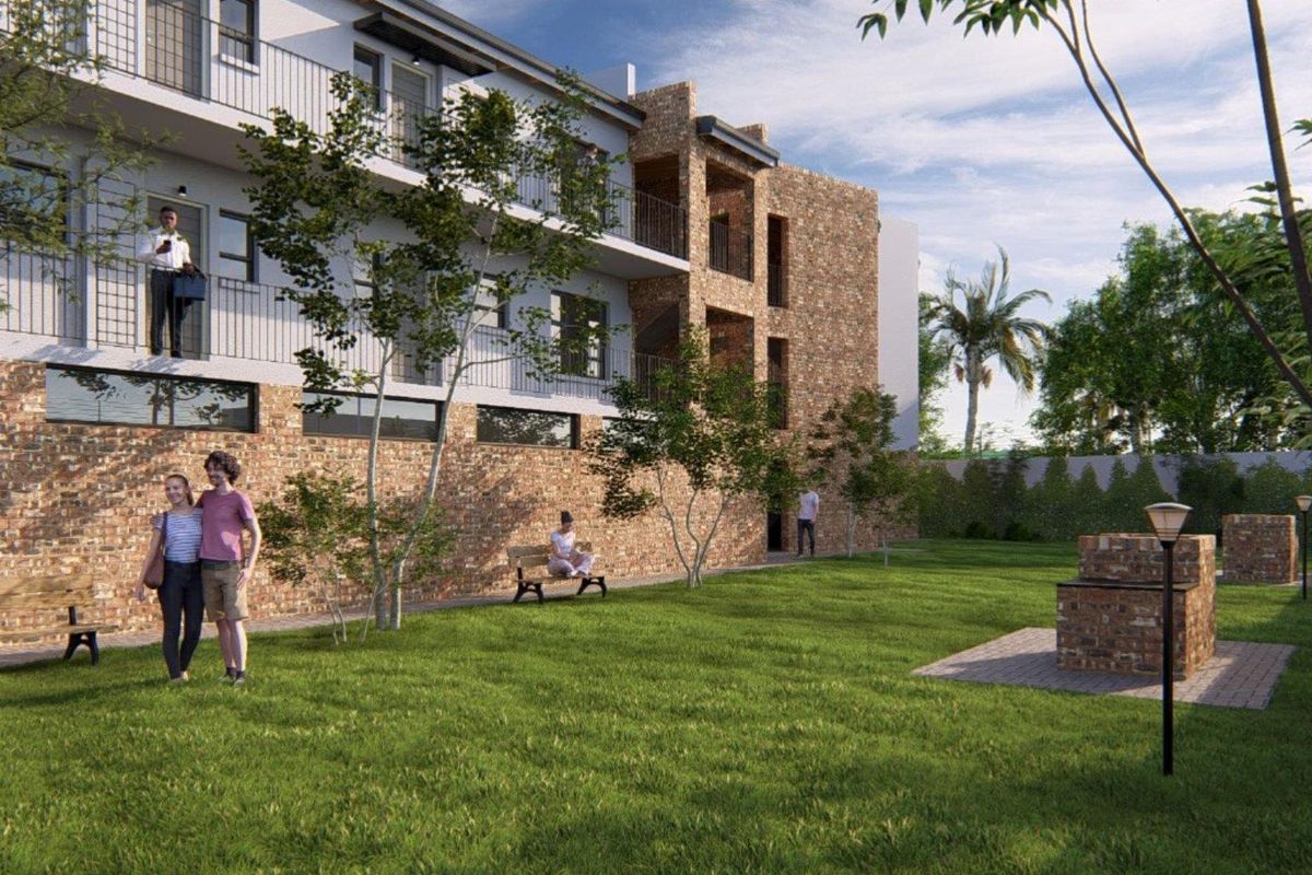A digital rendering of a townhouse complex exterior featuring a landscaped garden, brick facade, and private balconies.