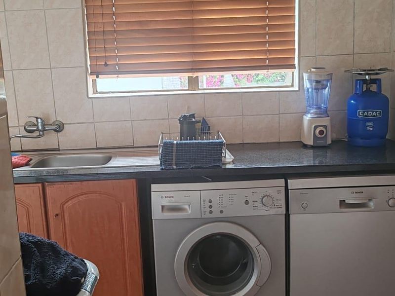 Midrand's Finest: Modern Comfort in a Serene Setting - Photo 9