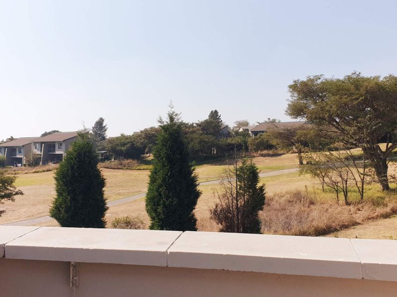Stylish Golf Estate Living | Spacious Penthouse Apartment with Dual Balconies in Jackal Creek - Photo 6
