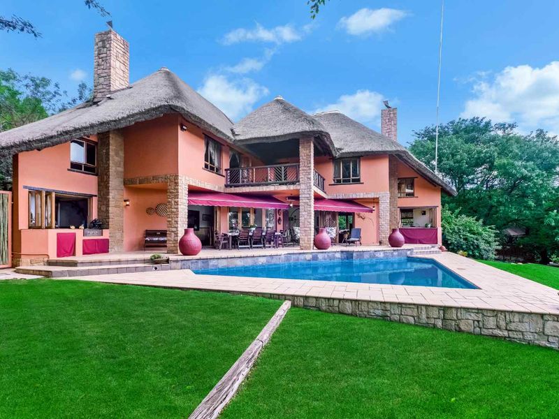 AN EXQUISITE, BUSH LODGE-THEMED, FAMILY SANCTUARY OFFERING TIMELESS ELEGANCE AND UNMATCHED TRANQUILITY IN A SERENE INDIGENOUS GARDEN SETTING - Photo 2