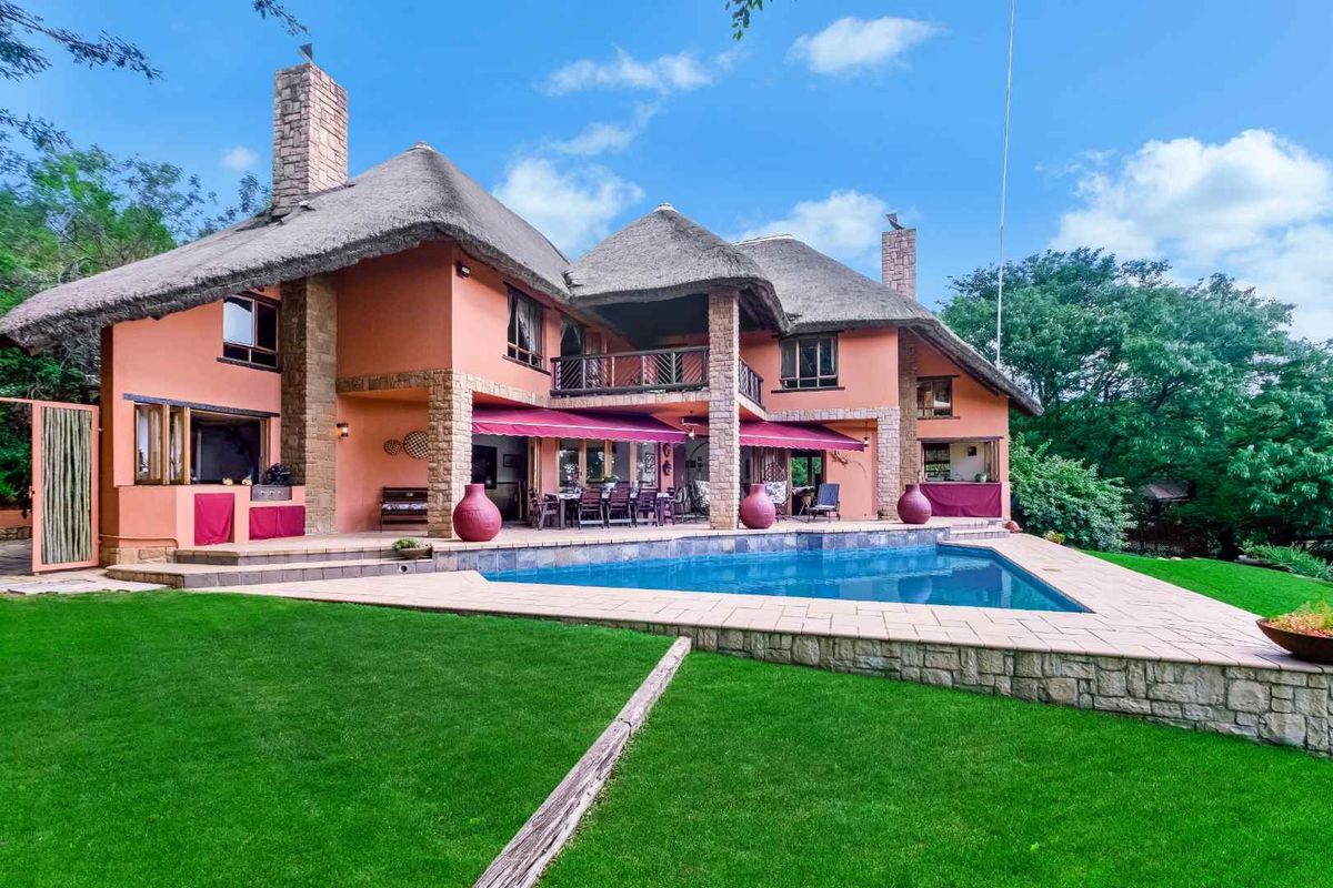 AN EXQUISITE, BUSH LODGE-THEMED, FAMILY SANCTUARY OFFERING TIMELESS ELEGANCE AND UNMATCHED TRANQUILITY IN A SERENE INDIGENOUS GARDEN SETTING - Photo 2