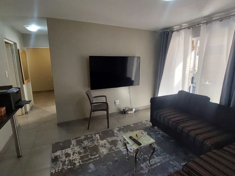 Cozy 2-Bed Ground-Floor Unit with Private Patio & Storage - Photo 6