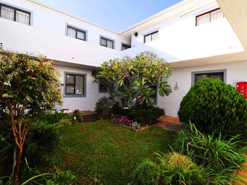 Coastal Comfort Meets Smart Investment! - Photo 1