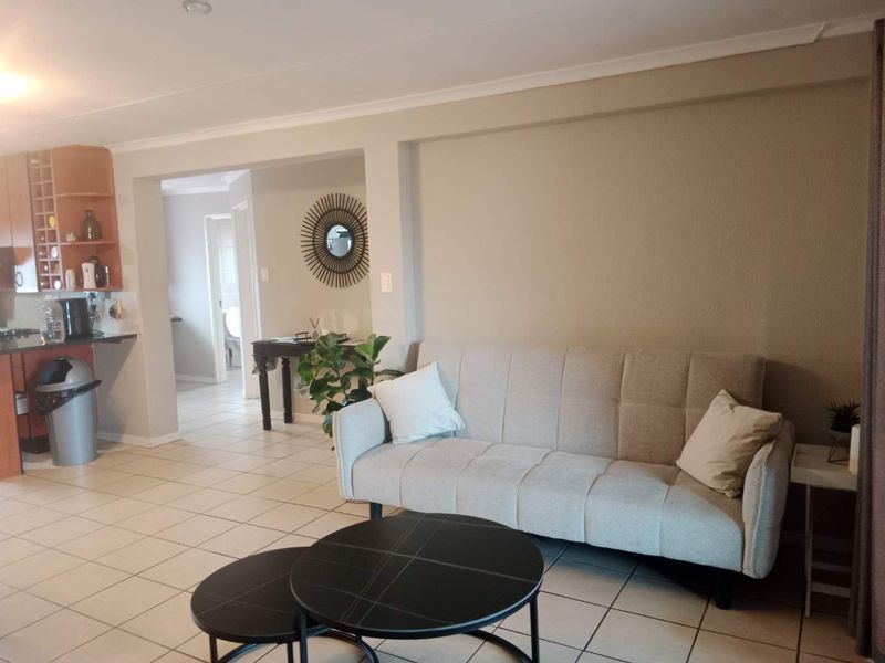2 Bedroom, 2 Bathroom First-Floor Apartment with Balcony and Built-in Braai To Let - Photo 1