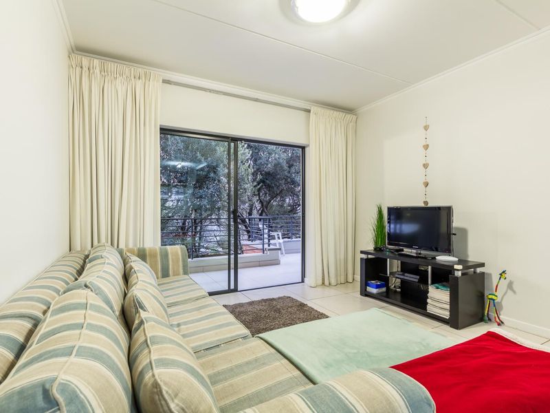 LOCK-UP AND GO LIVING AT ITS FINEST! - Photo 4