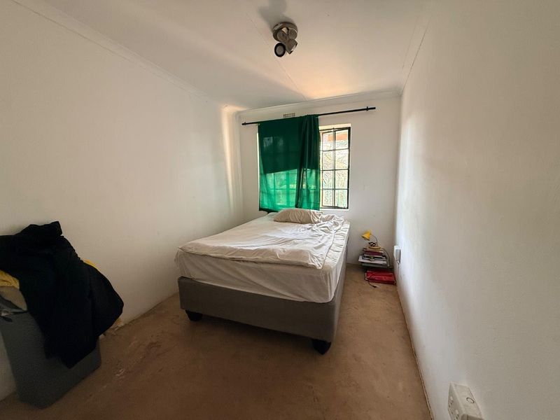 Charming 2-Bed Home with Two Bonus Units for Extra Income - Photo 6