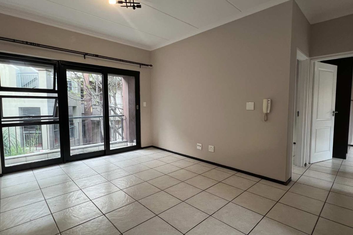 Live Securely in Style: 2-Bedroom Middle-Floor Gem! - Photo 4