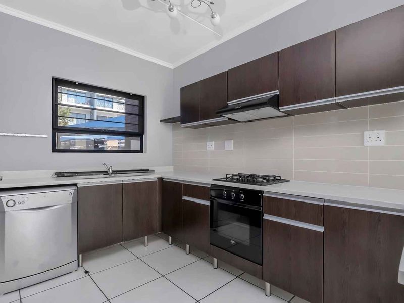 LOCK-UP AND GO LIVING AT ITS FINEST! - Photo 3