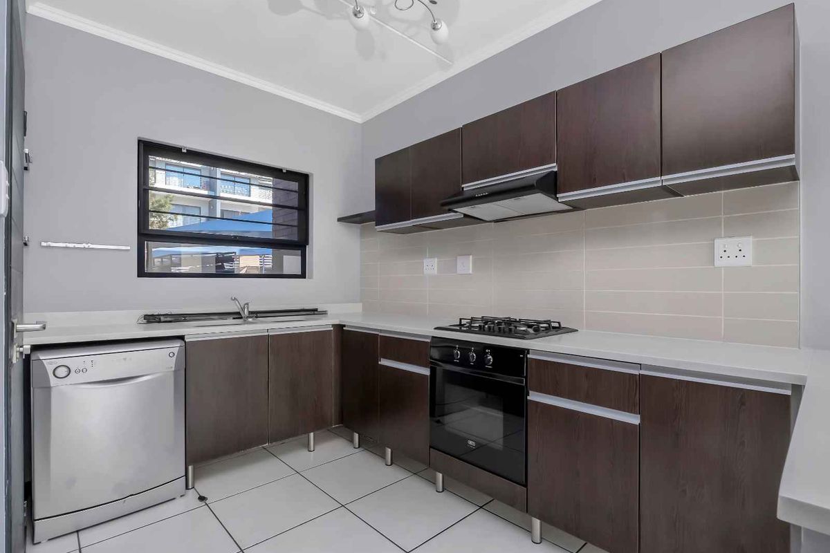 LOCK-UP AND GO LIVING AT ITS FINEST! - Photo 3