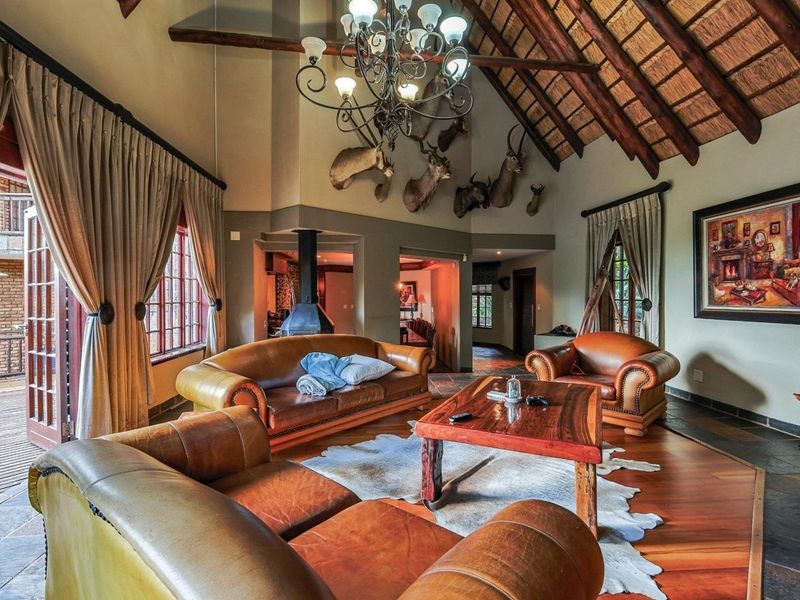 A Serene Bush Lodge-Style Home with Exceptional Family Space - Photo 3