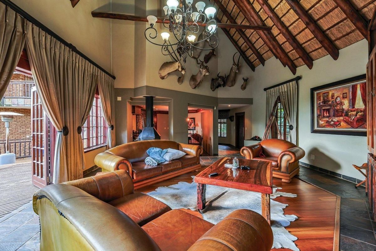 A Serene Bush Lodge-Style Home with Exceptional Family Space - Photo 3