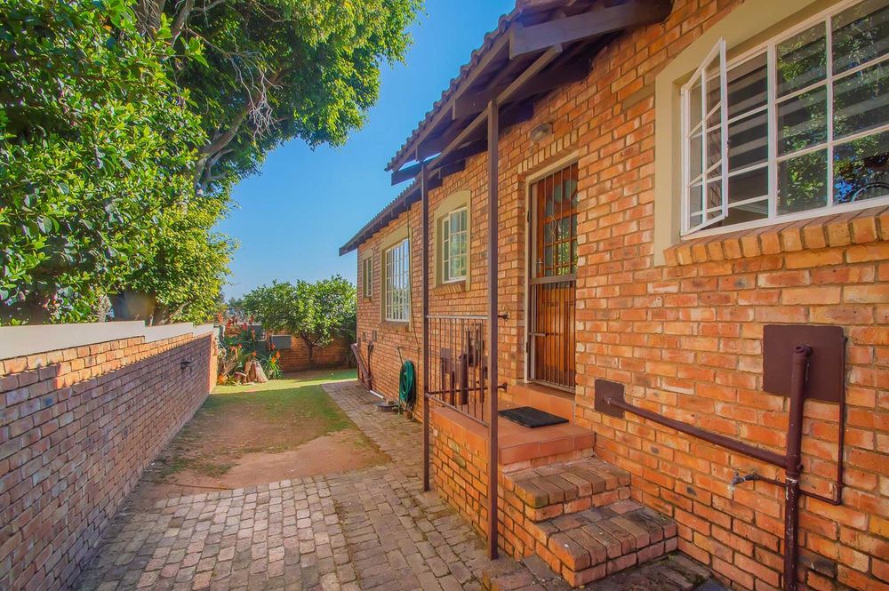 Private back door off kitchen to wrap around garden