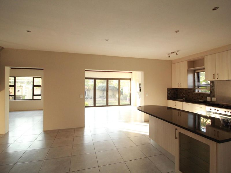 Elegant Family Living in a Quiet Cul-de-Sac | Blue Valley Golf Estate - Photo 6