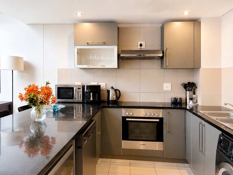 Exceptional Top Floor Apartment with Iconic Mountain & City Views - Photo 1