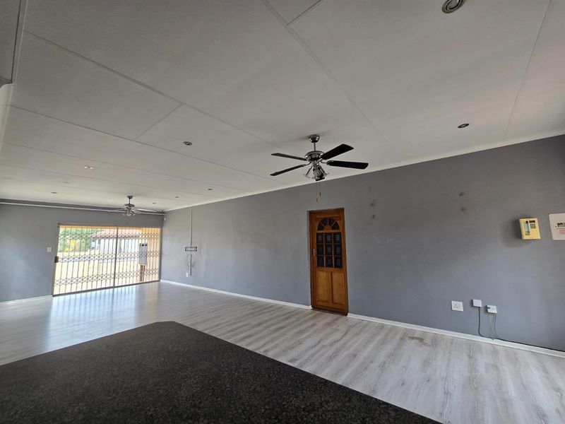 Stylish Family Living with Extra Space, Pet-Friendly Garden & Built-In Braai - Photo 10
