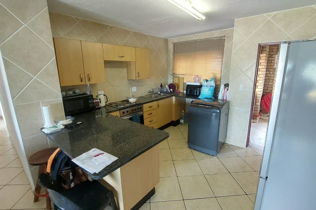 Open-Plan Living: Your Dream 2 Bedroom Home Awaits! - Photo 4