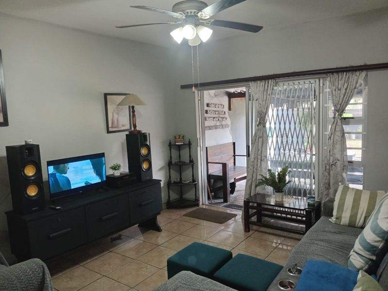 Step into this well-appointed 3-bedroom duplex, offering a perfect blend of comfort, style, and practicality. - Photo 2