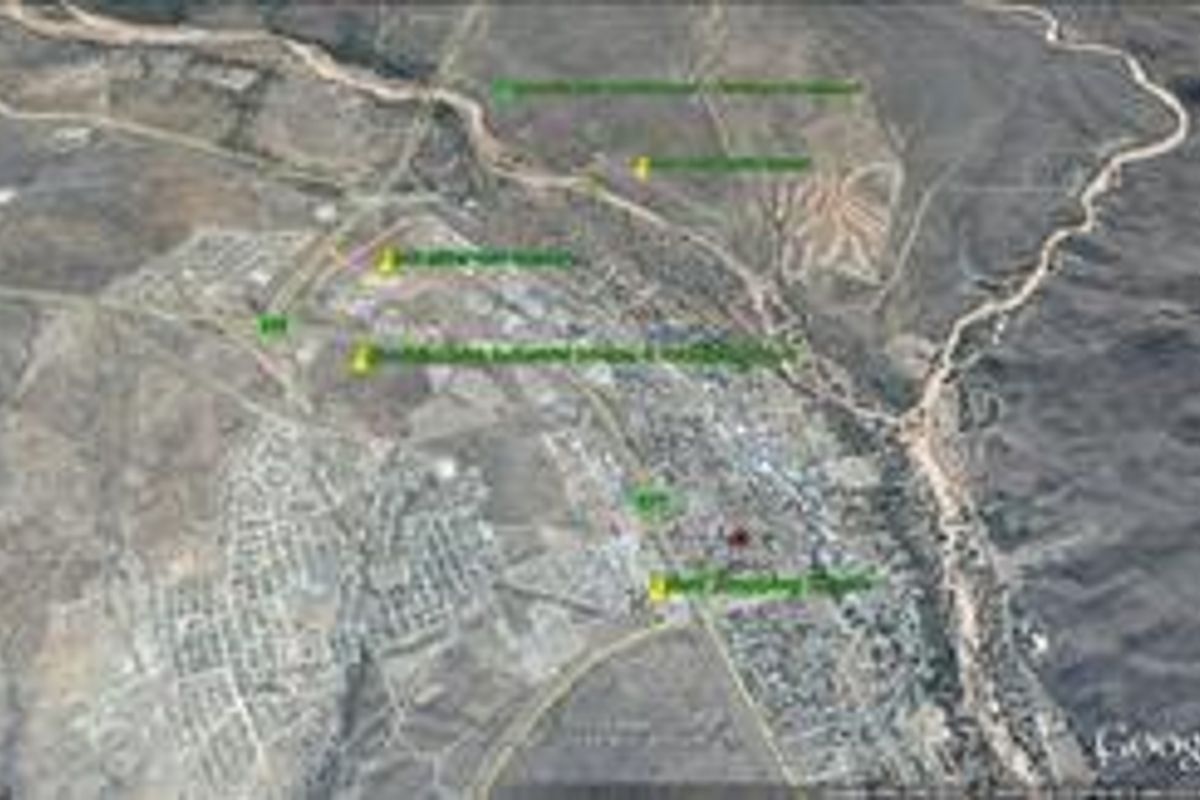 An aerial satellite view of the surrounding commercial area and local infrastructure.