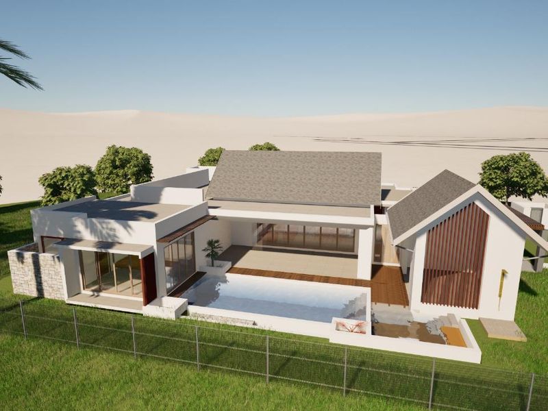 An aerial view of a modern architectural house design featuring a swimming pool, patio area, and contemporary roof structures.