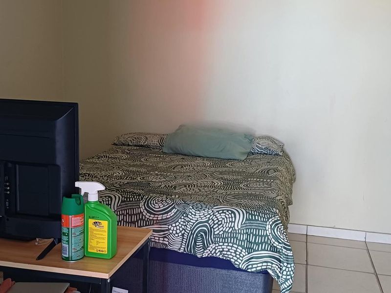 This affordable apartment in Extension 6 is ideal for single professionals, young couples, and first-time buyers wanting a safe and cozy place to call home! 🏡 - Photo 9