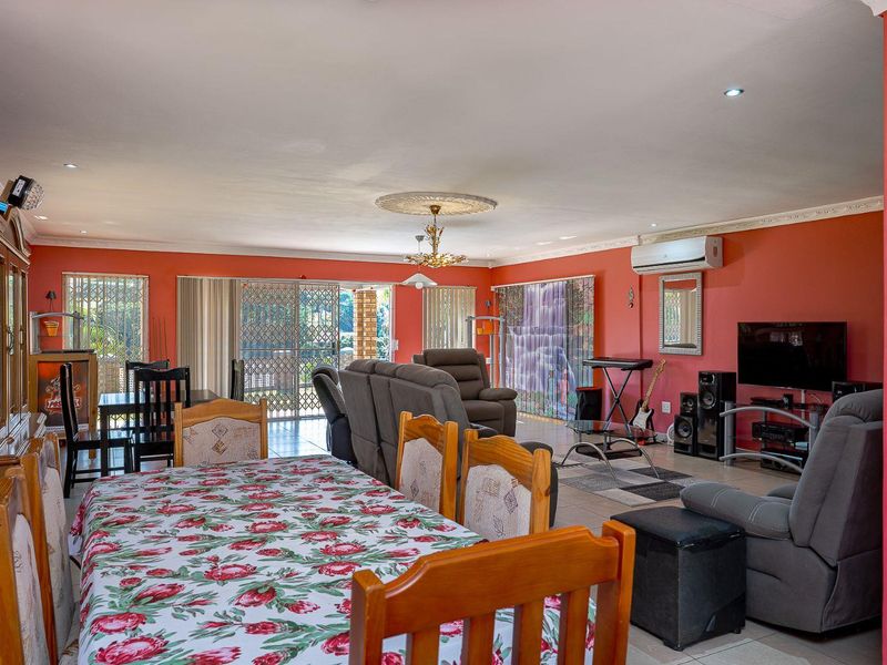 Spacious 4-Bedroom Home with Modern Comforts & Serene Green Views - Photo 8