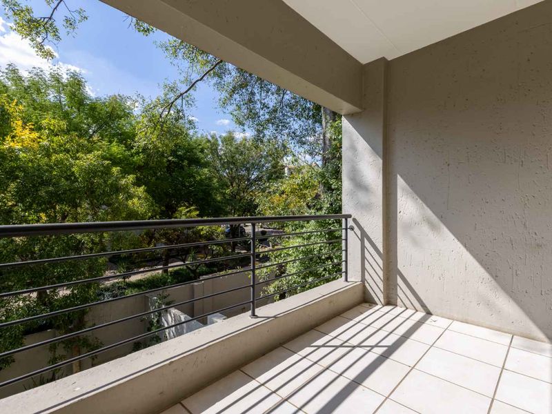 A WELL- POSITIONED MIDDLE FLOOR UNIT IN SOUGHT AFTER TEQUILA SUNRISE - Photo 9