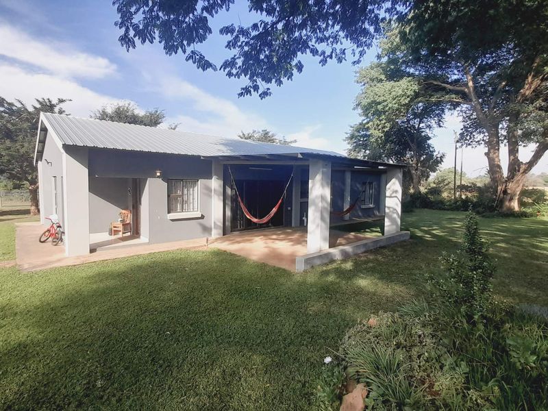 "Peaceful Retreat: Solar Estate with 2 Homes & Lush Gardens!" - Photo 2