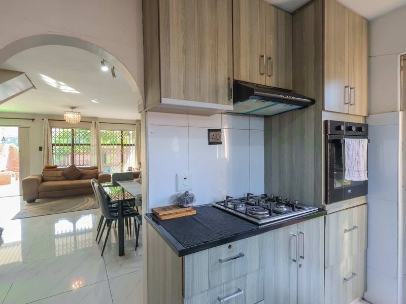 Stylish 3-Bedroom Duplex- Entertain In Style with Private Garden and Built In Braai - Photo 9