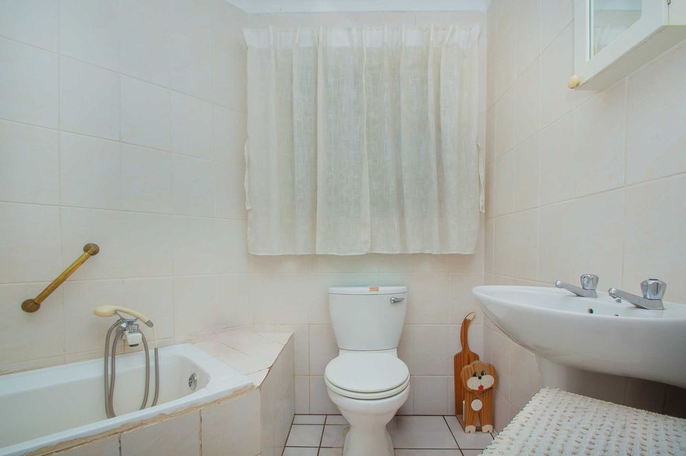 Family bathroom , fully tiled