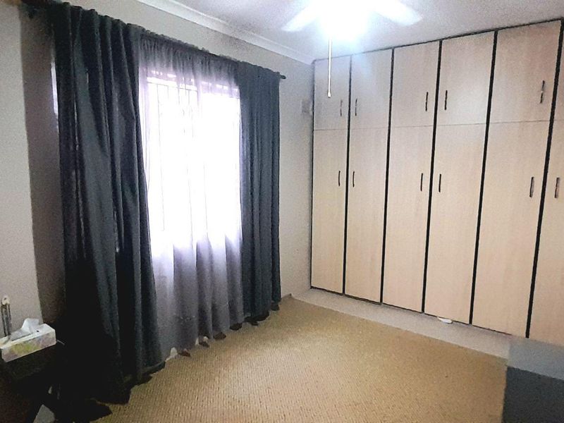 Sunford 4-Bedroom Haven: Perfect for Modern Family Living - Photo 9