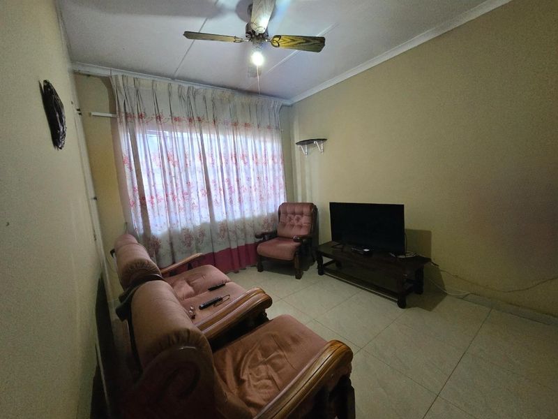 Spacious Four-Bedroom Family Home with potential Flatlet and Scenic Views - Photo 3