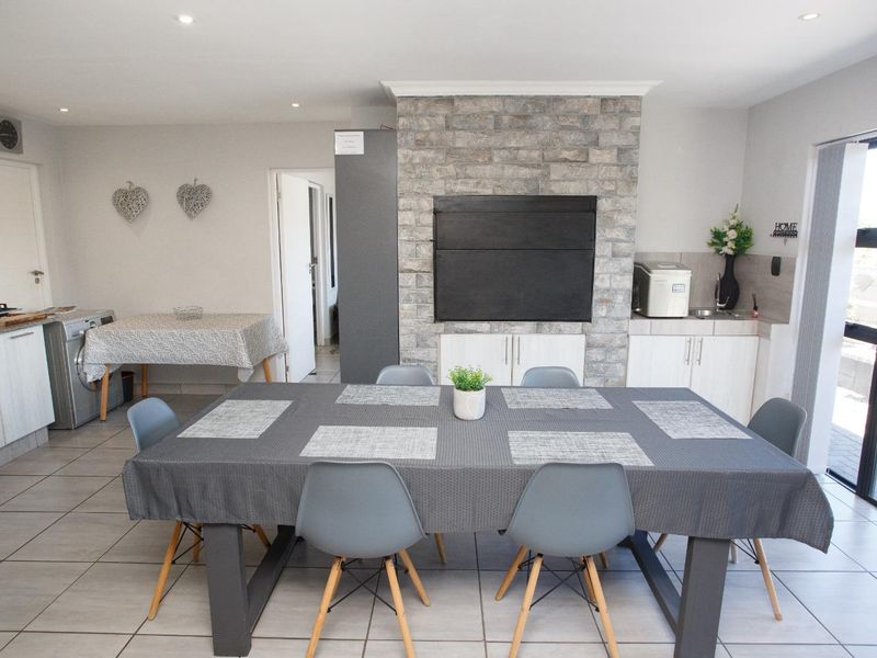 Elegant 5 Bedroom Home in Reebok with Income-Generating Potential - Photo 10