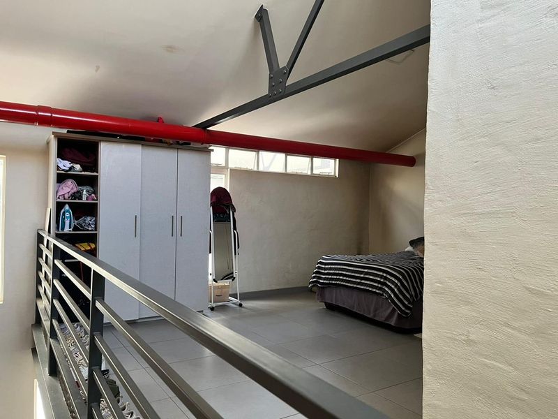 Charming Loft Living: Modern Comfort in a Secure Complex! - Photo 6