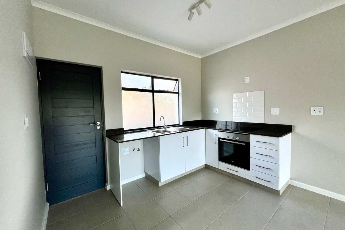 Brand New First Floor Apartment with Scenic Views! - Photo 3