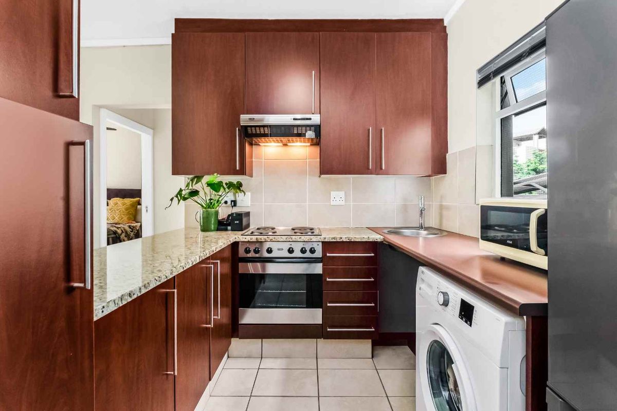 IDEAL LOCK-UP AND GO GROUND FLOOR UNIT IN SOUGHT AFTER TINZA LIFESTYLE ESTATE - Photo 5
