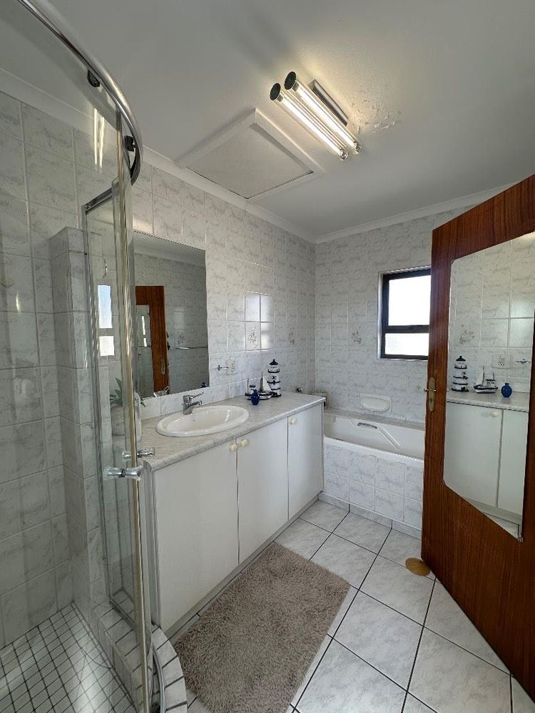 Ensuite bathroom with shower and bath