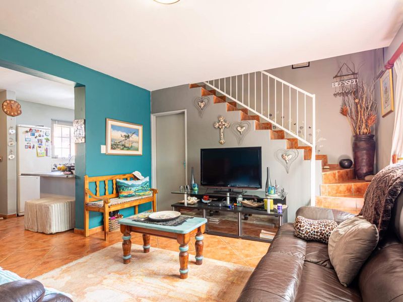 **Charming Duplex with Modern Comforts in Pristine Condition** - Photo 5