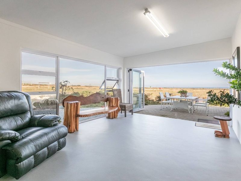 Modern Spacious Living at the Beach with Sea Views - Photo 5