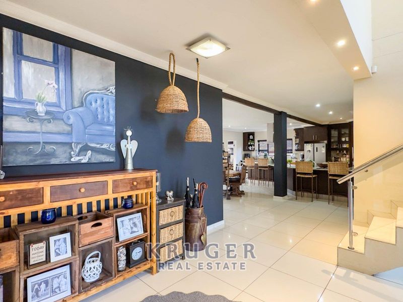 A HOME THAT WHISPERS LUXURY - Photo 9