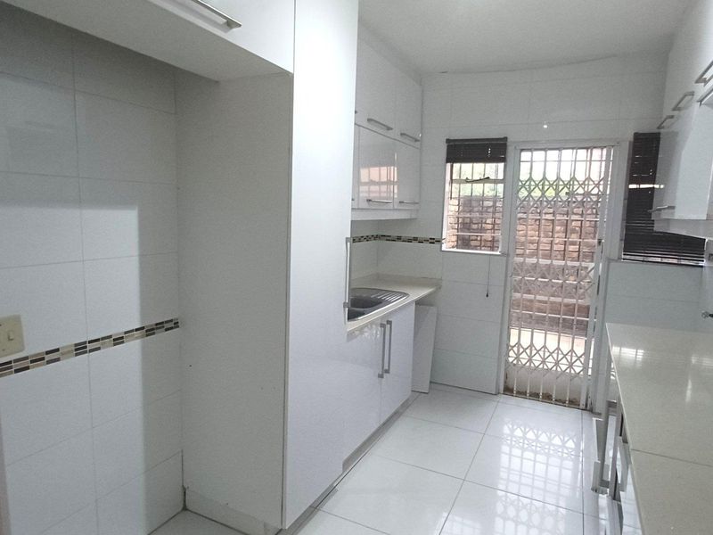 Spacious, Affordable Double-Storey Living with Patio & Pool - Photo 4