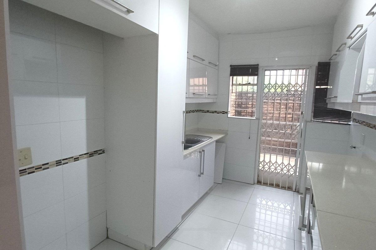 Spacious, Affordable Double-Storey Living with Patio & Pool - Photo 4