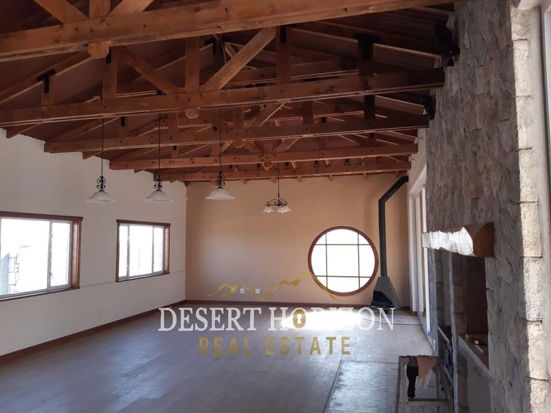 Erongo , Rossmund | Charming Double-Storey Home with Modern Amenities and Scenic Surroundings - Photo 5