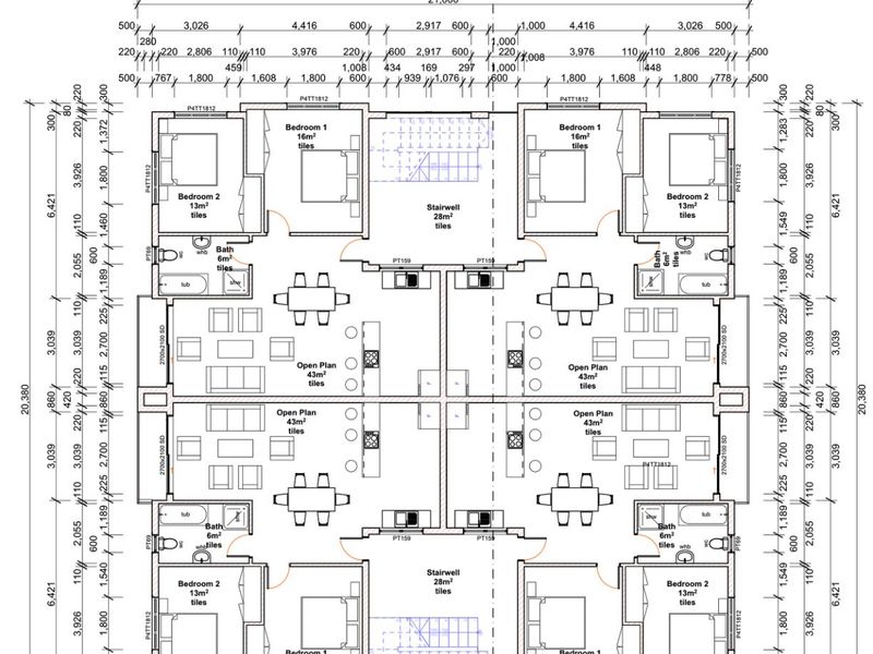 Architectural floor plan showing the layout of a multi-unit apartment building with open plan living areas, bedrooms, bathrooms, and central stairwells.