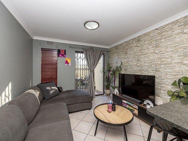 Secure Ground Floor Living with a Private Patio - Photo 3