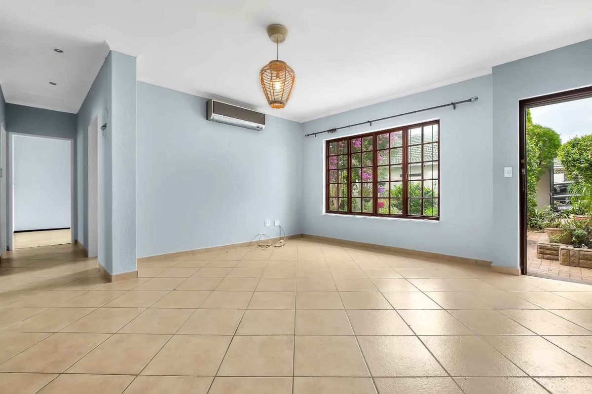 BRIGHT AND LIGHT THREE BEDROOM HOME WITH ALL THE ADDED EXTRAS - Photo 3