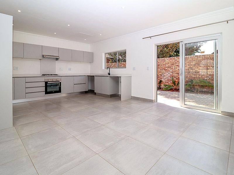 Modern Comfort Meets Secure Garden Living! - Photo 4